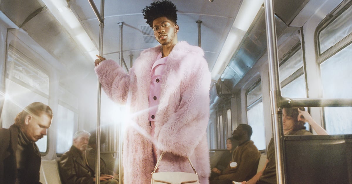 Lil Nas X Pairs a Purple Shearling Coat With a Tan Purse For Coach