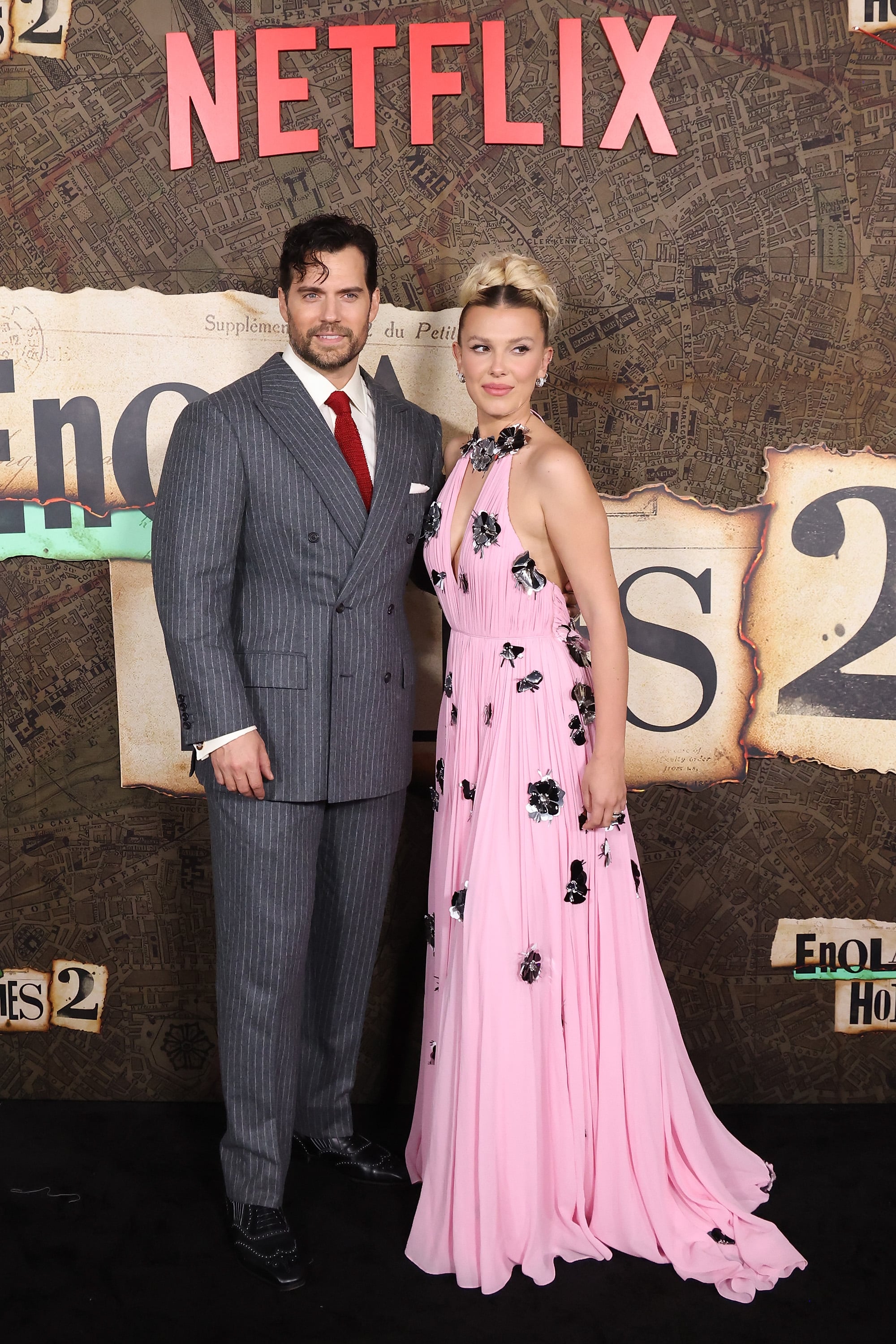 NEW YORK, NEW YORK - OCTOBER 27: Henry Cavill and Millie Bobby Brown attend the world premiere of Netflix's 